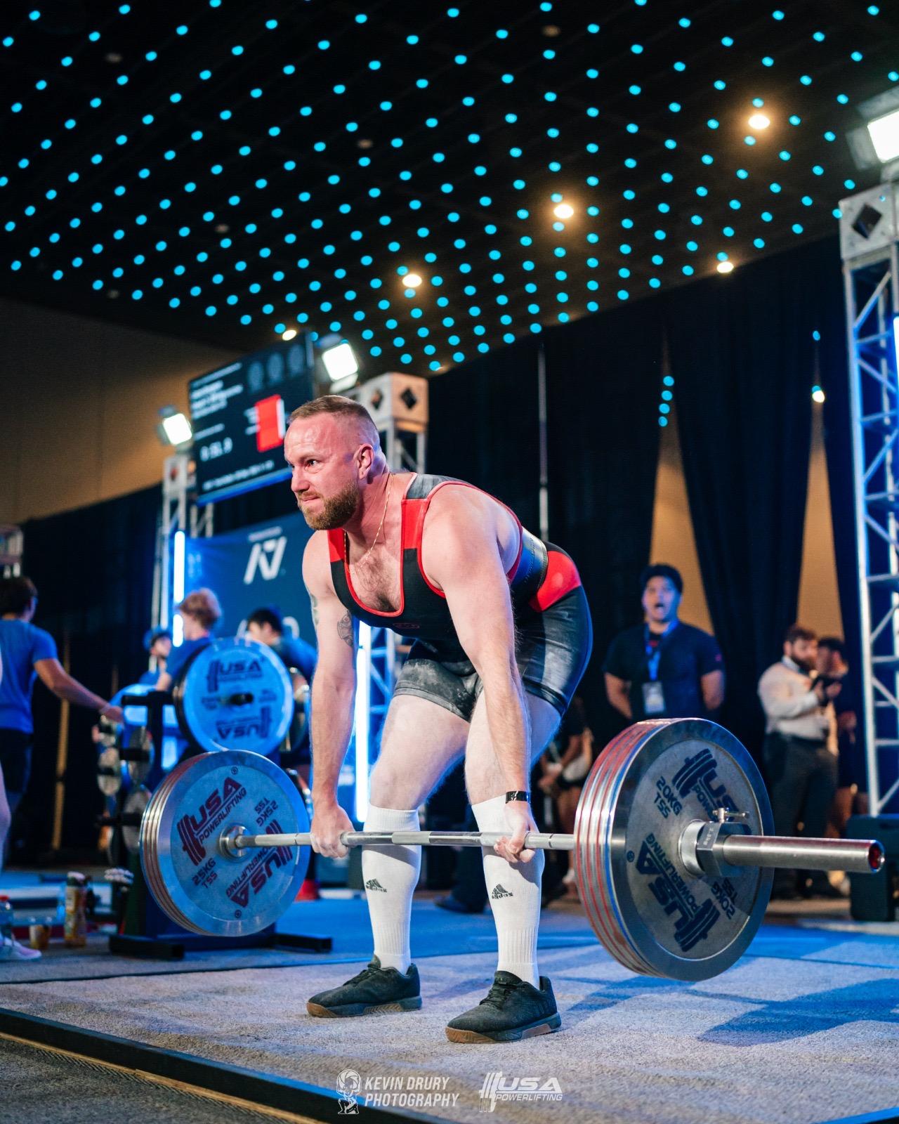 Client locked in before a deadlift attempt
